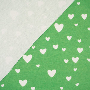 Tissu vert motif à cœur